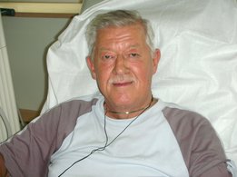 Male patient smiling during dialysis
